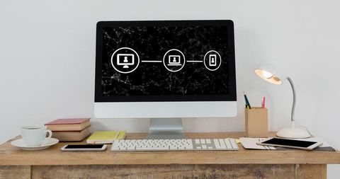 Modern Workspace with Technology Icons on Computer Monitor - Download Free Stock Images Pikwizard.com