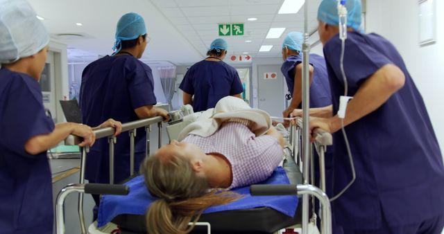 Doctors And Nurses Transporting Patient On Gurney In Hospital - Download Free Stock Images Pikwizard.com