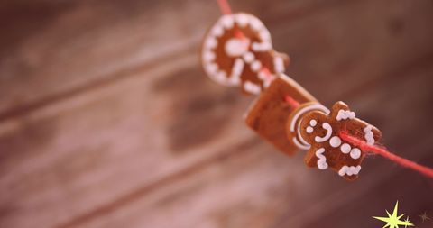 Christmas Gingerbread Cookies Hanging on String - Download Free Stock Images Pikwizard.com