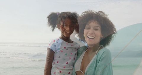 Joyful Mother and Daughter Surfing Adventure at Sunny Beach