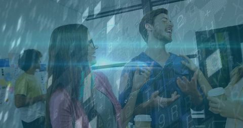 Coworkers Discussing Ideas in Modern Office with Digital Technology Overlay