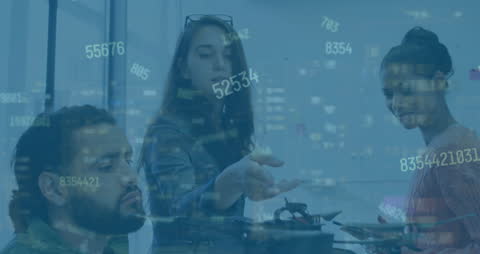 Dynamic Team Analyzing Data in Modern Office with Digital Overlay