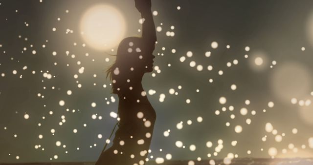 Silhouette of Person Dancing with Bokeh Light Effects - Download Free Stock Images Pikwizard.com