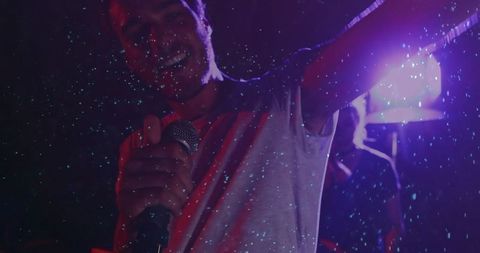 Dynamic lead singer performing live on club stage