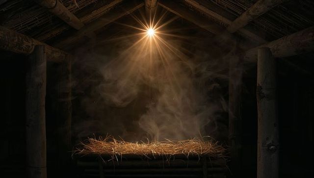 Empty rustic manger bathed in starburst light with floating dust and straw