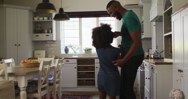 Father and Daughter Dancing in Cozy Kitchen - Download Free Stock Images Pikwizard.com