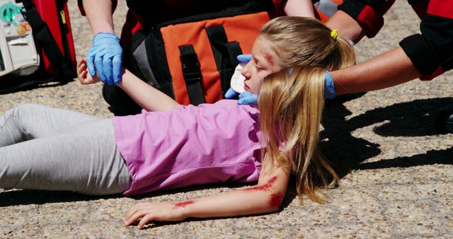 Emergency Medical Team Assisting Injured Girl on Street - Download Free Stock Images Pikwizard.com