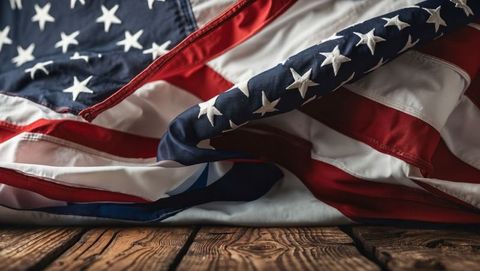 American Flag Draped on Rustic Wooden Surface for Nostalgic Appeal