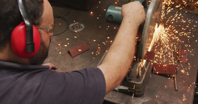 Metal Worker Grinding Steel with Sparks Flying - Download Free Stock Images Pikwizard.com