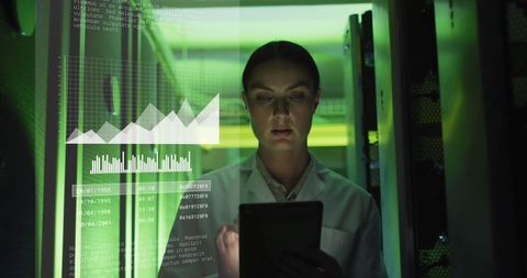 Woman Analyzing Data in Technology Server Room Environment - Download Free Stock Images Pikwizard.com