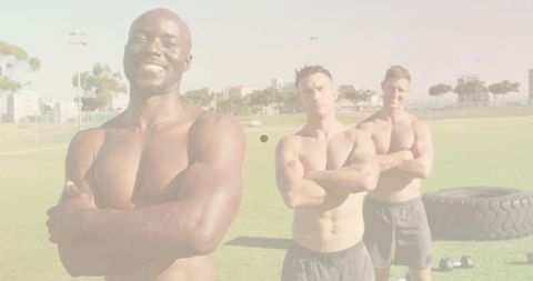 Athletic Men Outdoors Showcasing Fitness and Strength