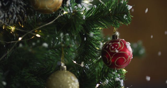 Image of christmas tree with baubles and fairy lights decorations on blurred background. christmas, tradition and celebration concept.