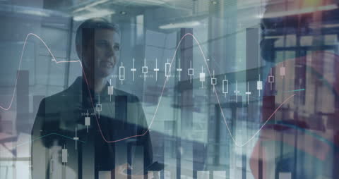 Businesswomen Discussing with Financial Data Overlay