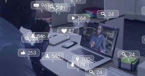 Executive watching remote presenter on laptop with social media engagement icons overlay