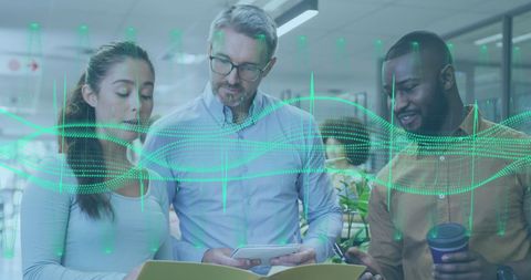 Diverse business team analyzing digital data visualization