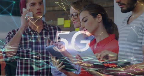 Team Collaborating with Digital and 5G Technology