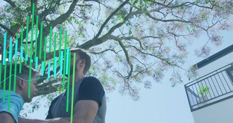 Man and boy standing beneath flowering tree looking up with teal data overlays and balcony