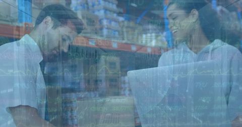 Warehouse Workers Analyzing Logistics with Financial Graphs Overlay