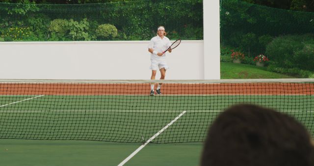 Senior Man Playing Tennis Outdoors - Download Free Stock Images Pikwizard.com