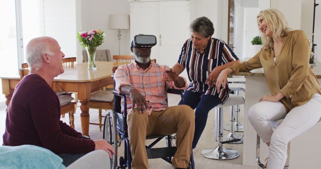 Senior Man in Wheelchair Using VR Headset with Group of Friends - Download Free Stock Images Pikwizard.com