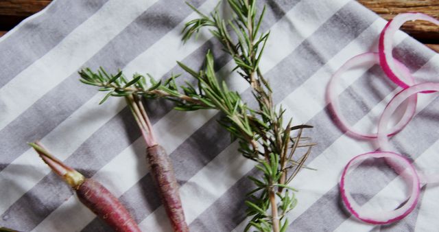 Fresh Rosemary and Carrots on Striped Tablecloth - Download Free Stock Images Pikwizard.com