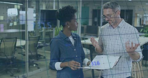 Business People Analyzing Financial Data in Modern Office