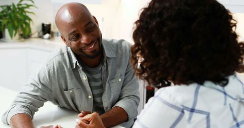 Friendly Meeting in Contemporary Interior with Smiling Professional
