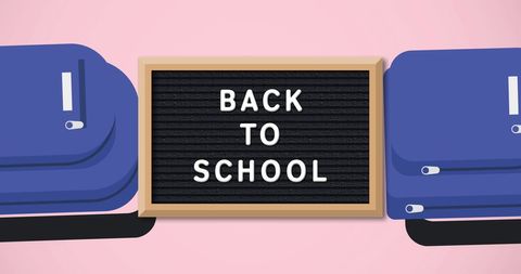 Back to School Text on Blackboard with School Bags