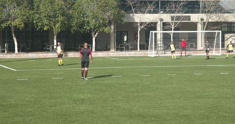 Youth Soccer Team Training on Field Preparing for Match