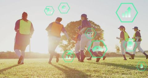 Athletes warming up with metric icons at sunset on sports field