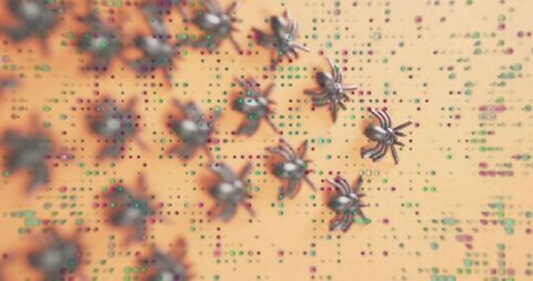 Metallic spiderlike microrobots crawling on circuit wafer with colorful node grid