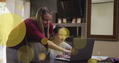Mother Helping Daughter with Laptop Homework in Bright Home - Download Free Stock Images Pikwizard.com