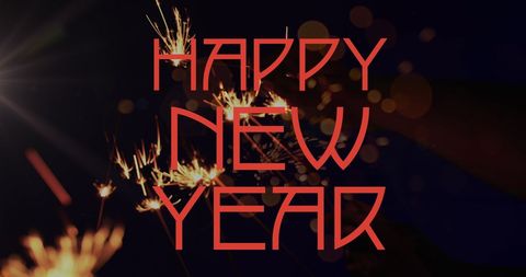 New Year Celebration Sparklers and Red Text Greeting - Download Free Stock Images Pikwizard.com