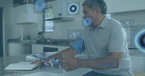 Senior man monitoring health with digital blood pressure device in modern kitchen