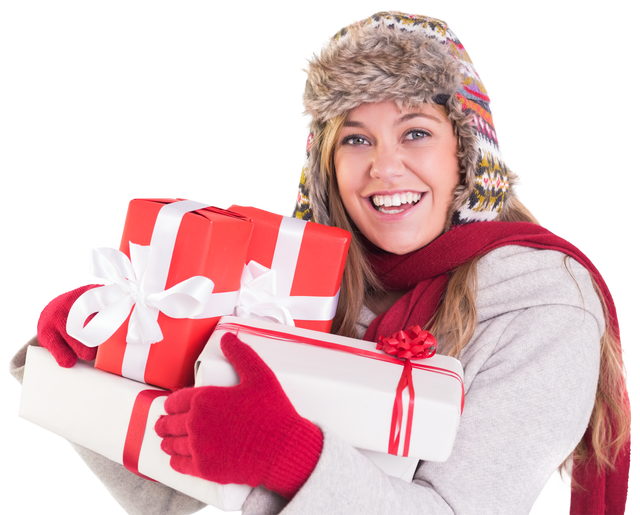 Smiling Woman in Winter Outfit Holding Gift Boxes on Transparent Background - Download Free Stock Videos Pikwizard.com