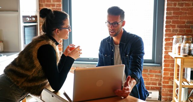 Young Professionals Collaborating in Modern Industrial Office - Download Free Stock Images Pikwizard.com