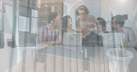 Team Collaborating on Financial Ideas with Digital Data Overlay - Download Free Stock Images Pikwizard.com