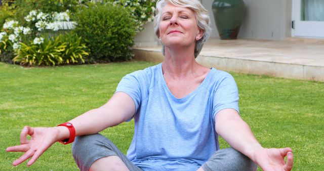 Senior Woman Meditating in Garden - Download Free Stock Images Pikwizard.com