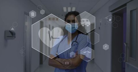 Healthcare Worker in Hospital Corridor Surrounded by Medical Icons