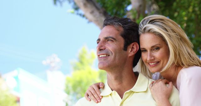 Happy couple enjoying outdoors together on sunny day - Download Free Stock Images Pikwizard.com