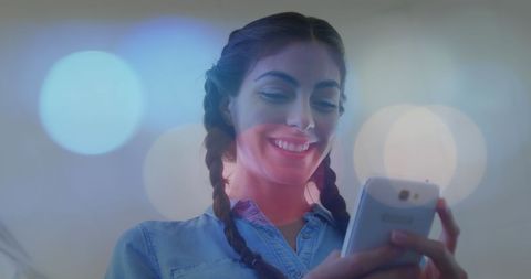 Latino Businesswoman Engaging with Smartphone and Digital Overlay - Download Free Stock Images Pikwizard.com