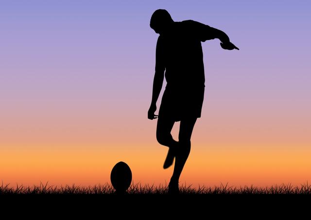 Silhouette of an athlete playing with a rugby ball at dusk, with a vibrant sunset sky in the background. Ideal for use in sports promotions, fitness campaigns, outdoor activity advertisements, and motivational posters.