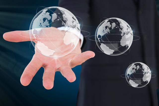 Businessman holding transparent globes in open hand represents global connections and technological innovation. Suitable for usage in business presentations, technology concept illustrations, global leadership themes, and international business solutions.