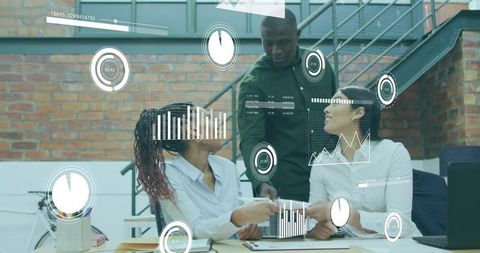 Team of professionals collaborating with digital data visualizations