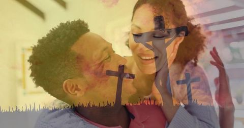 Embracing couple sharing faith and affection with crucifix overlay in warm double-exposure