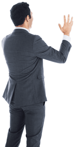 Businessman in suit from behind with raised hand on transparent background