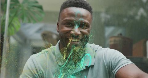 Man relaxing indoors with futuristic holographic effects