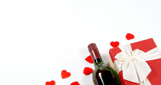 Wine Bottle with Gift Box and Red Hearts for Romantic Celebration - Download Free Stock Images Pikwizard.com