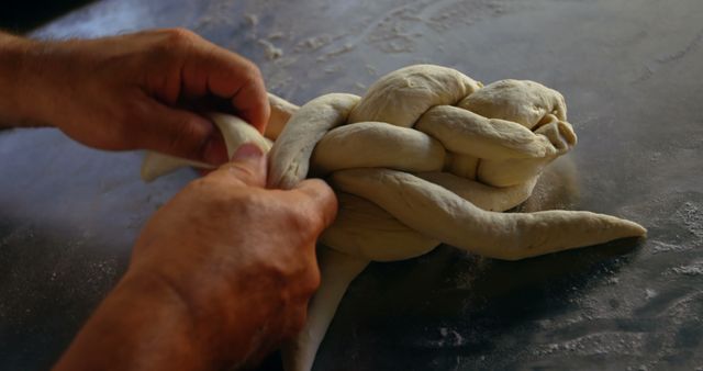 Hands Braiding Bread Dough on Floured Surface - Download Free Stock Images Pikwizard.com