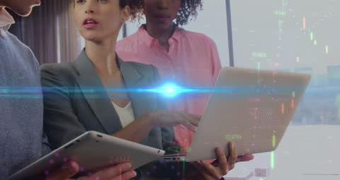 Business Professionals Analyzing Digital Data Trends in Office